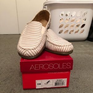 Brown and white slip on shoes